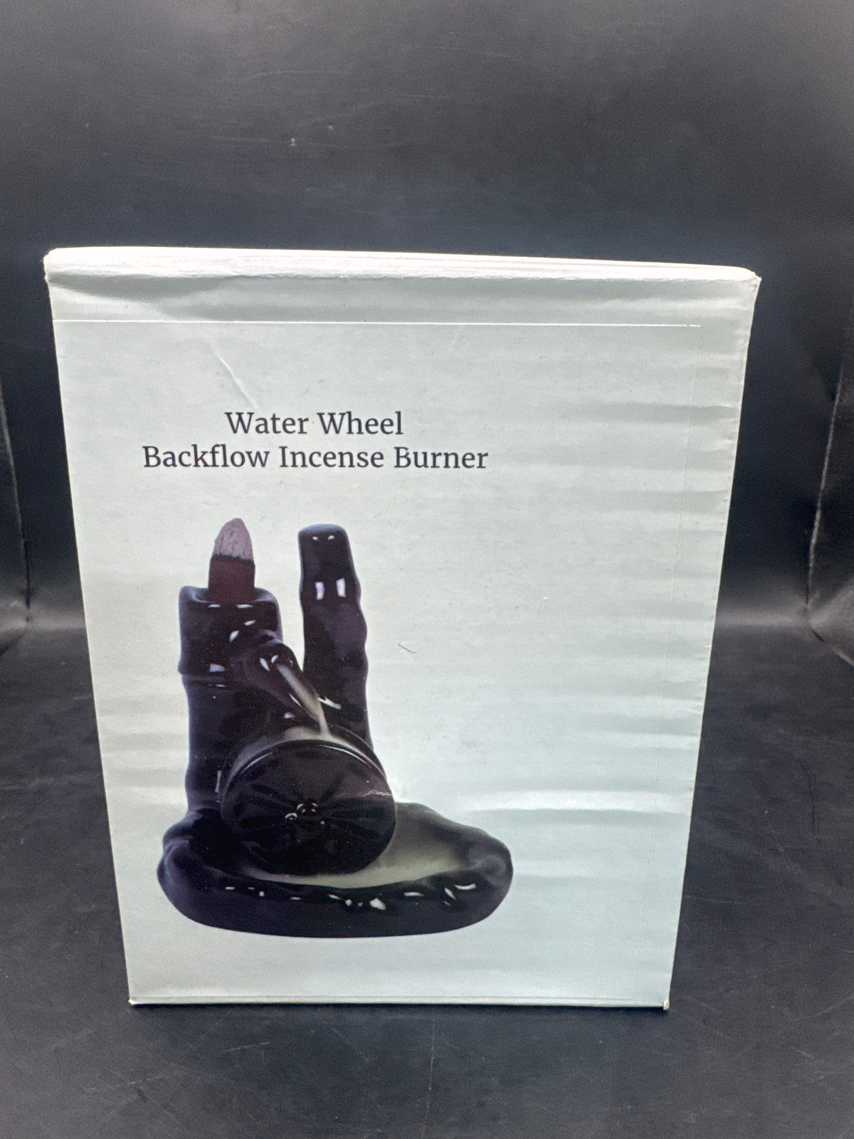 Water wheel backflow incense burner