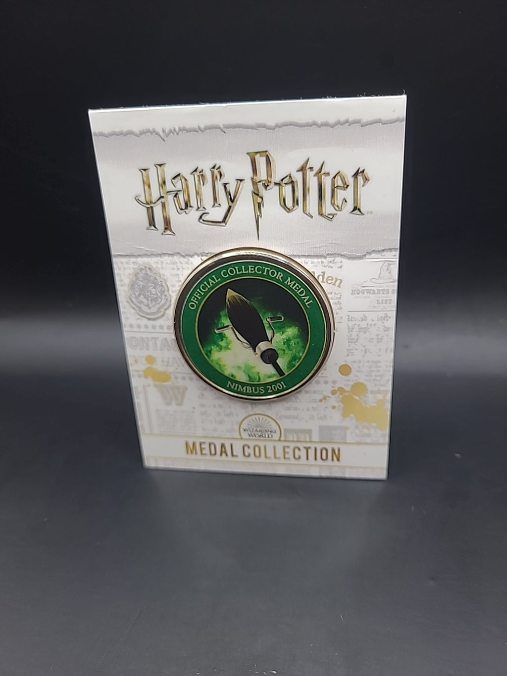 HARRY POTTER CARD WITH MEDAL NIMBUS 2001 J K ROWLING