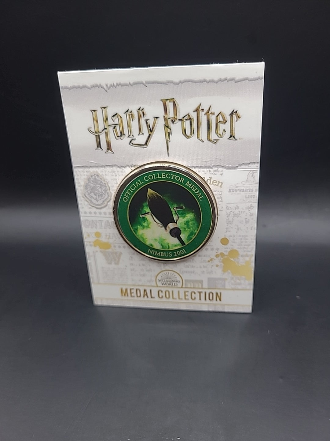 HARRY POTTER CARD WITH MEDAL NIMBUS 2001 J K ROWLING