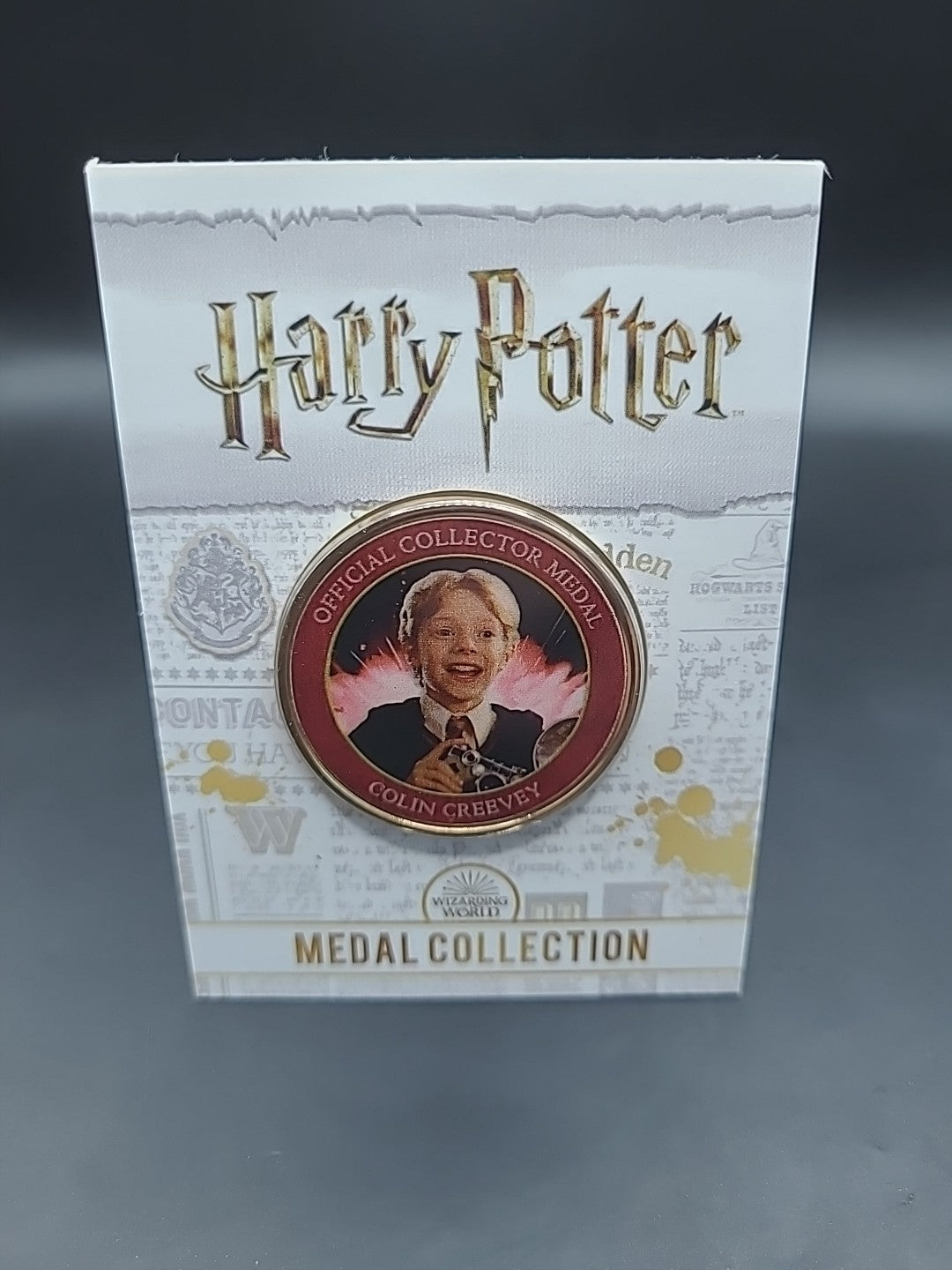 HARRY POTTER CARD WITH MEDAL COLIN CREEVEY HUGH MITCHELL J K ROWLING