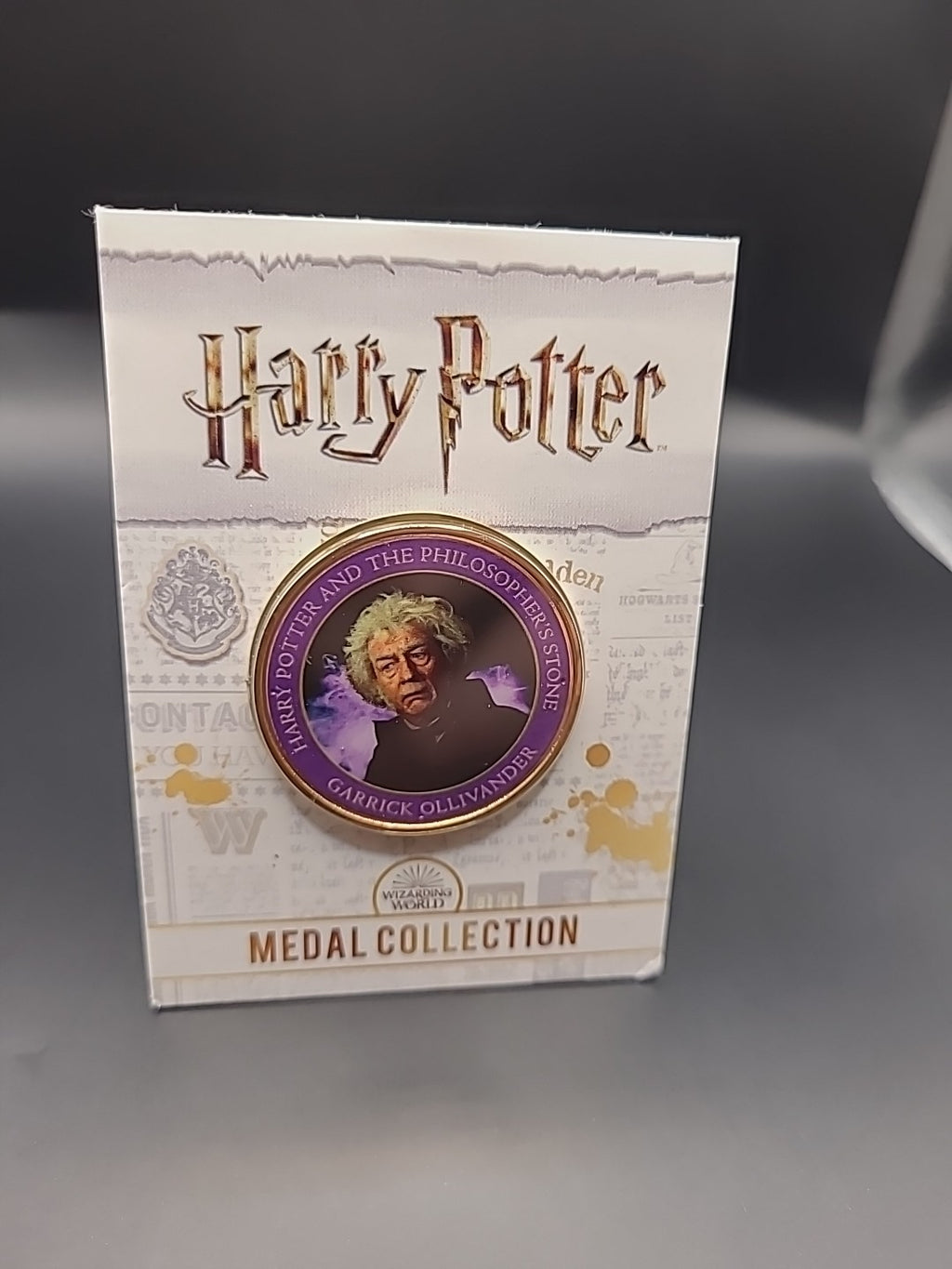 Harry Potter Medal Collection: Philosopher's Stone (Purple) Garrick Ollivander