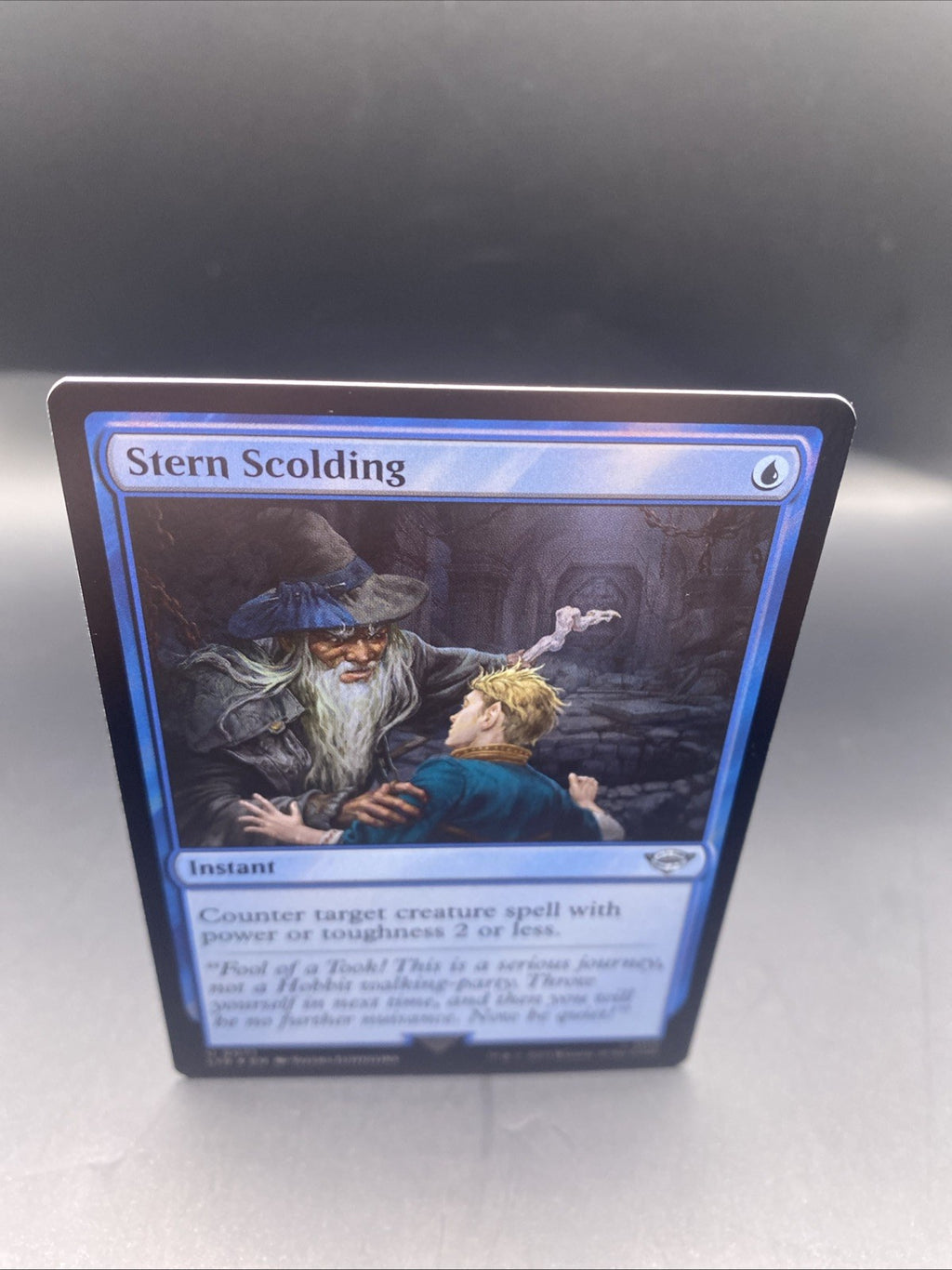 Stern Scolding Foil + 1 Regular Card, The Lord of the Rings MTG