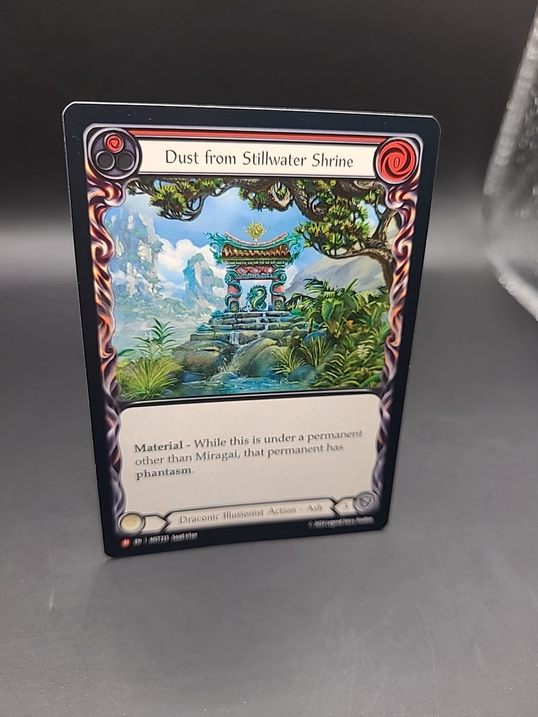Dust from Stillwater Shrine - MST235 - Majestic - REGULAR - Flesh and Blood TCG