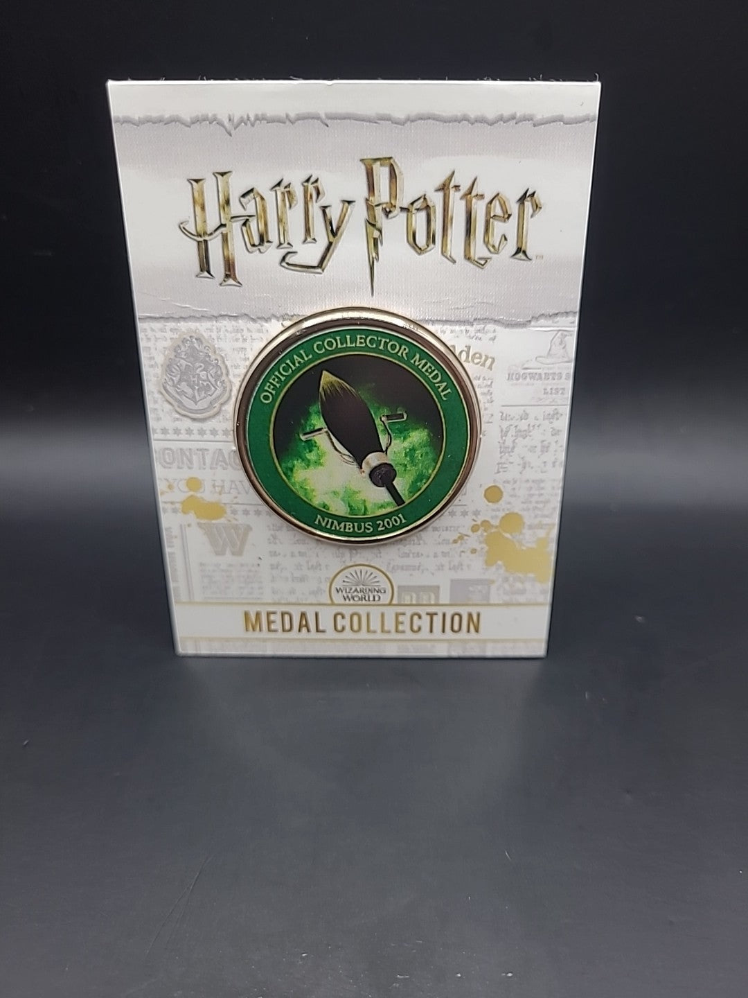 HARRY POTTER CARD WITH MEDAL NIMBUS 2001 J K ROWLING