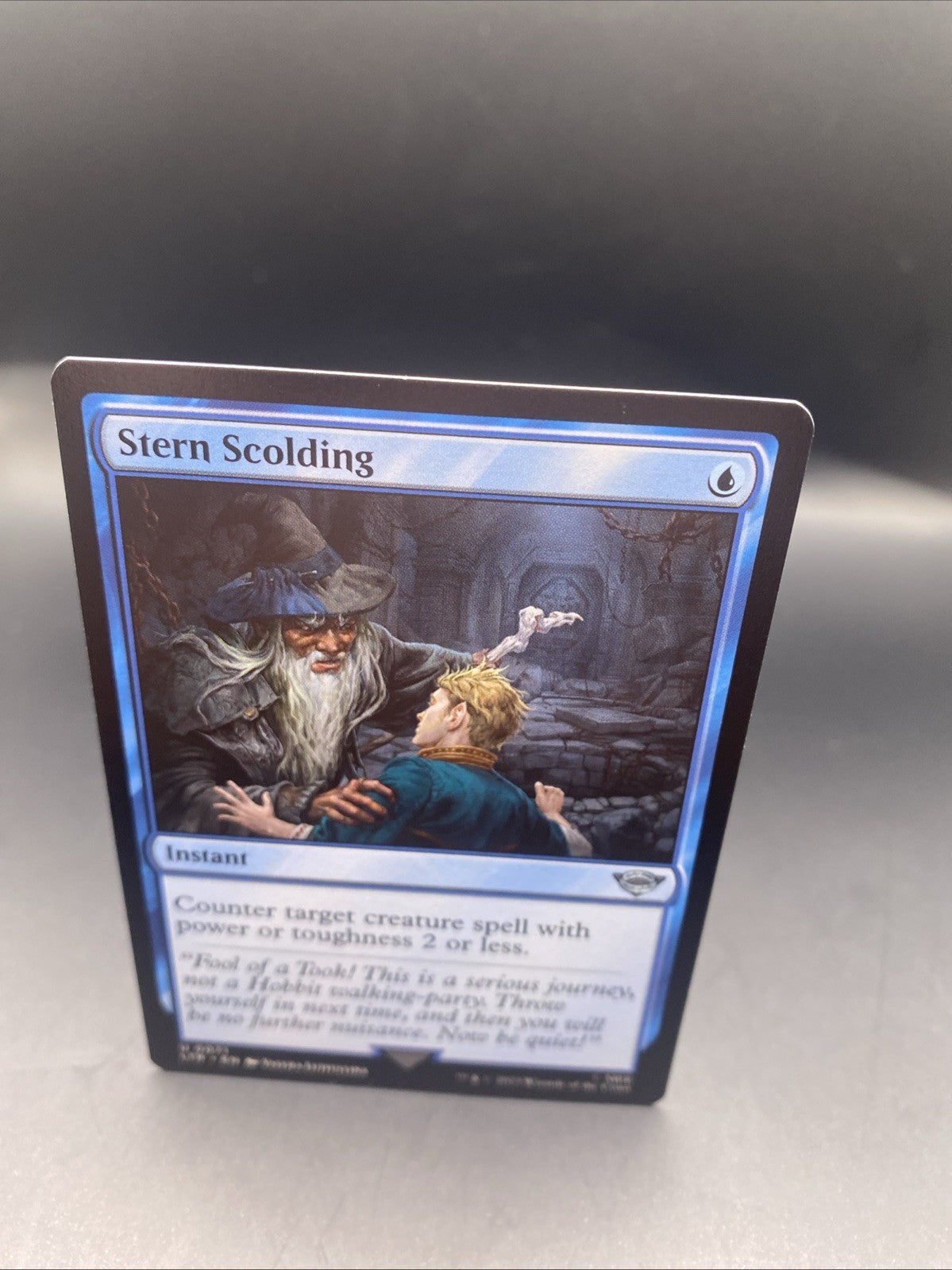 Stern Scolding Foil + 1 Regular Card, The Lord of the Rings MTG