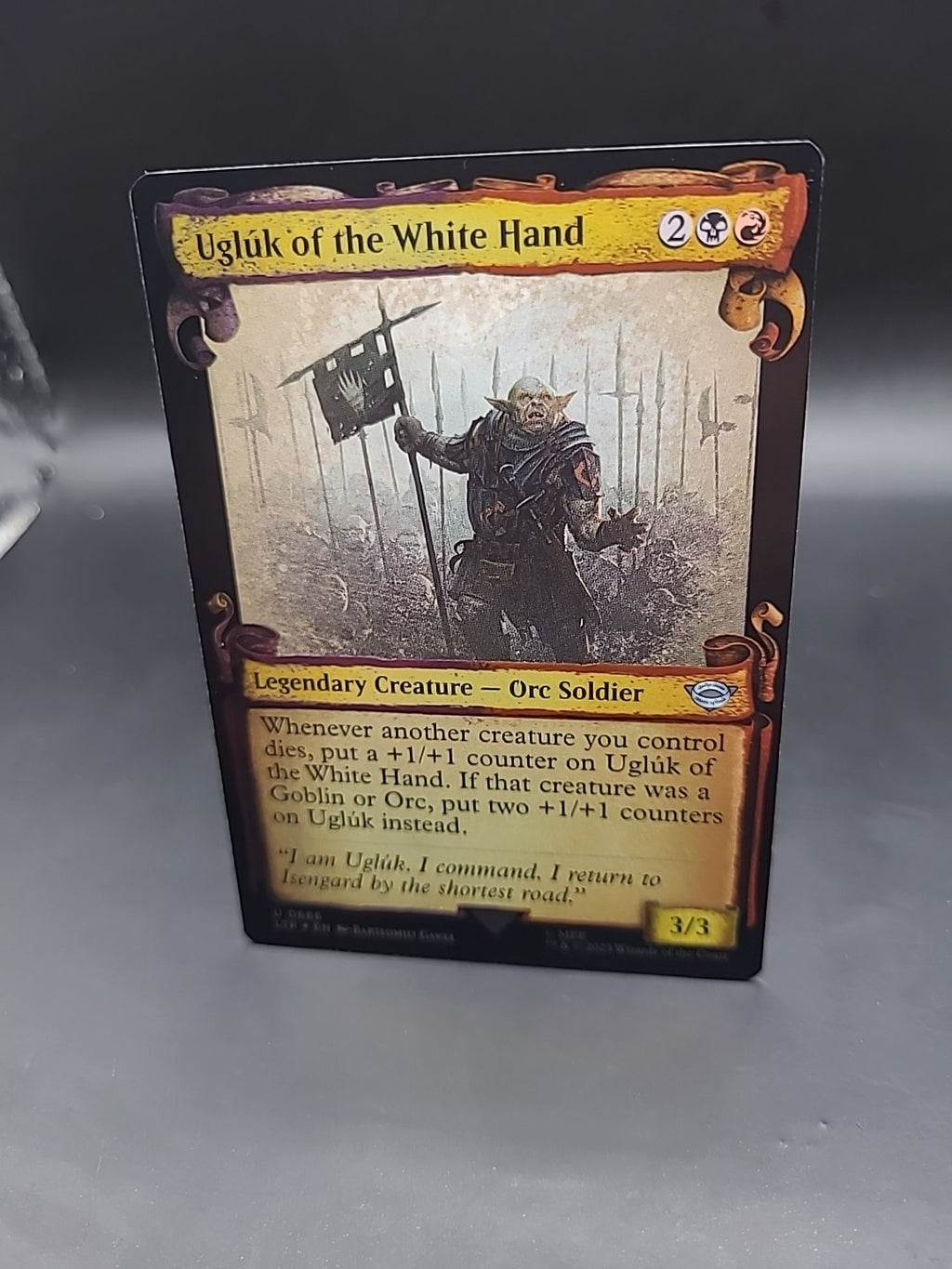 MTG Ugluk of the White Hand (Foil Scroll Showcase) [Tales of Middle-Earth U 0686