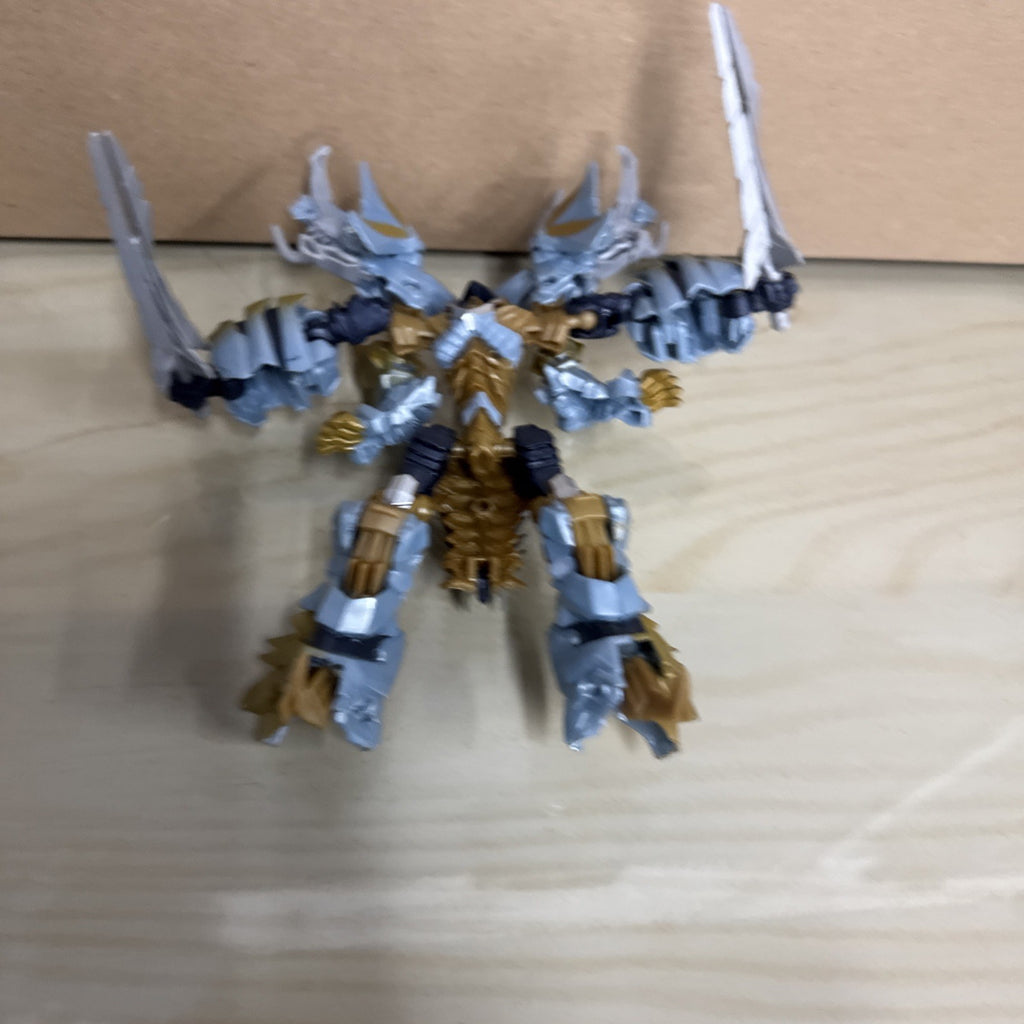 Transformers: The Last Knight Dinobot Slug Deluxe Premier Edition Complete