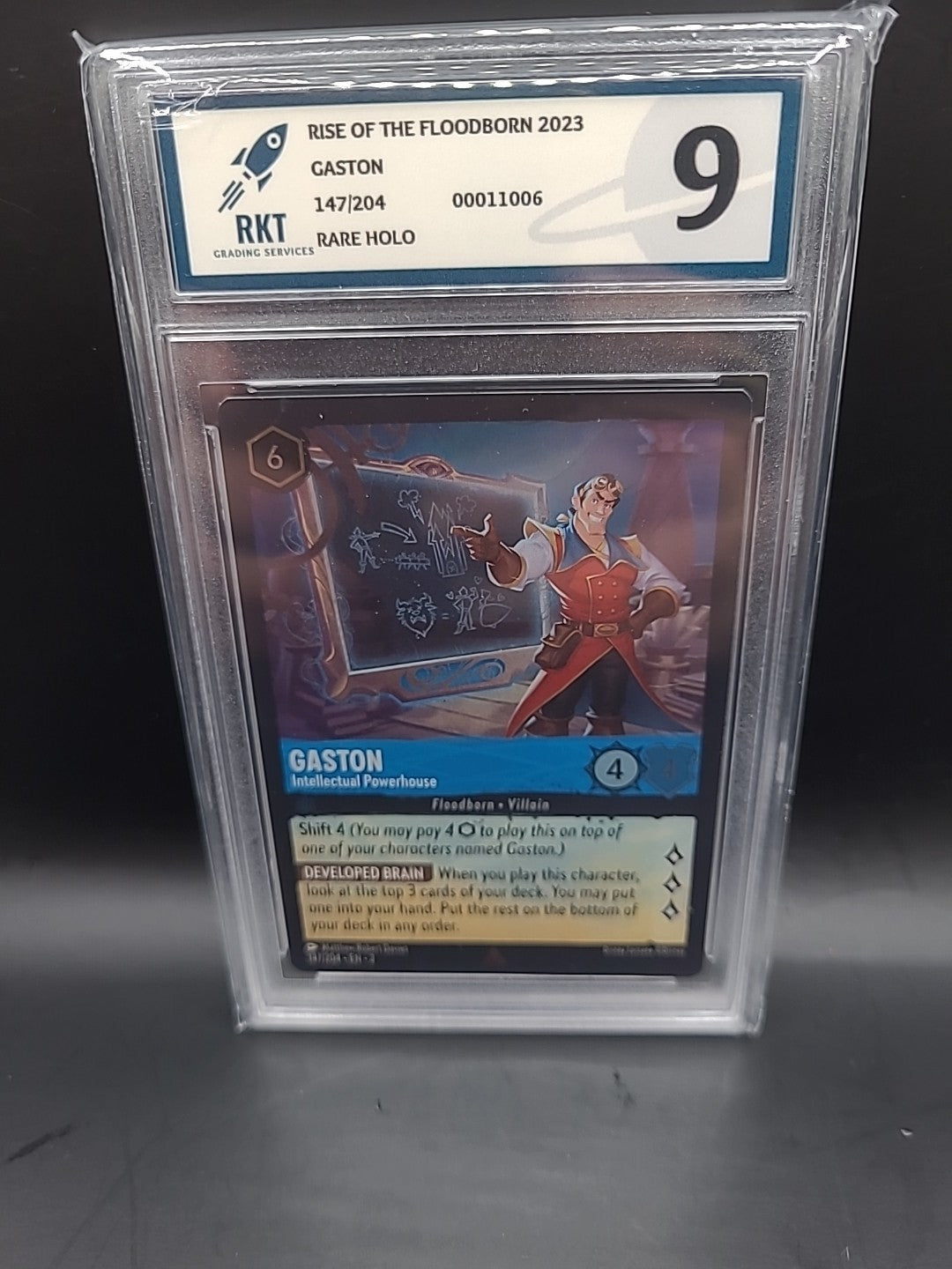 Disney Lorcana- Floodborn-Holo/Foil - Rare-  147/204 - Gaston RKT Graded 9