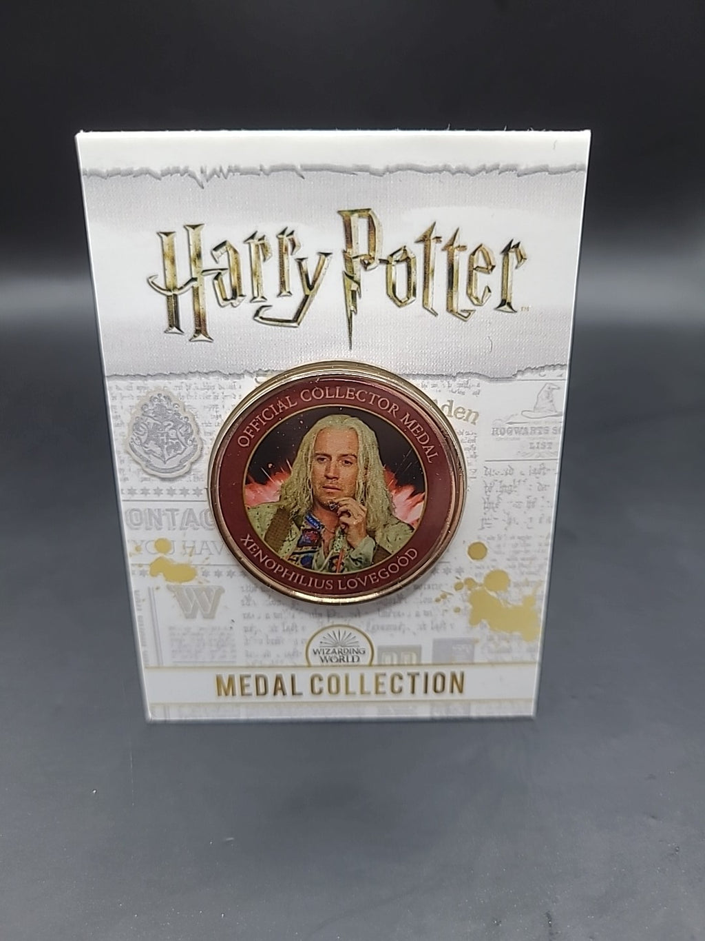 HARRY POTTER MEDAL XENOPHILIUS LOVEGOOD RHYS IFANS JK ROWLING WARNER BROS