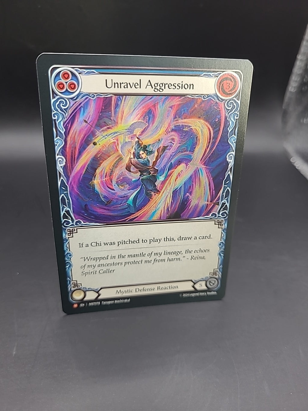 Unravel Aggression Foil - MST078 NM - FaB Flesh and Blood