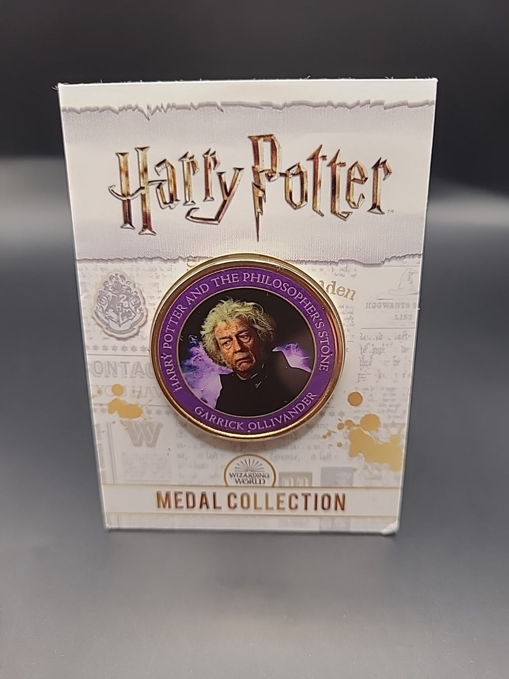 Harry Potter Medal Collection: Philosopher's Stone (Purple) Garrick Ollivander