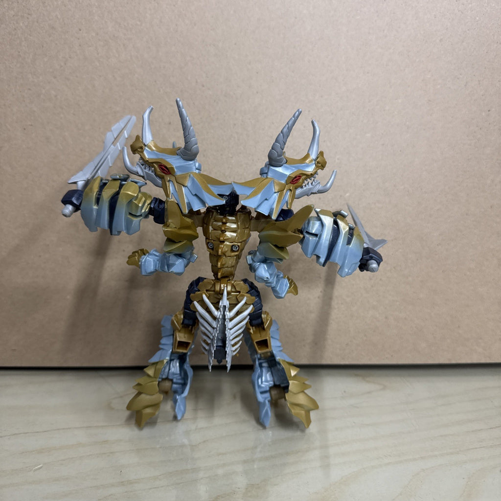 Transformers: The Last Knight Dinobot Slug Deluxe Premier Edition Complete