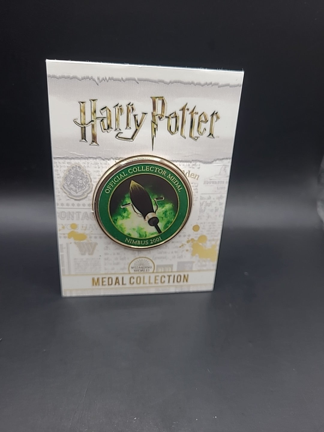 HARRY POTTER CARD WITH MEDAL NIMBUS 2001 J K ROWLING