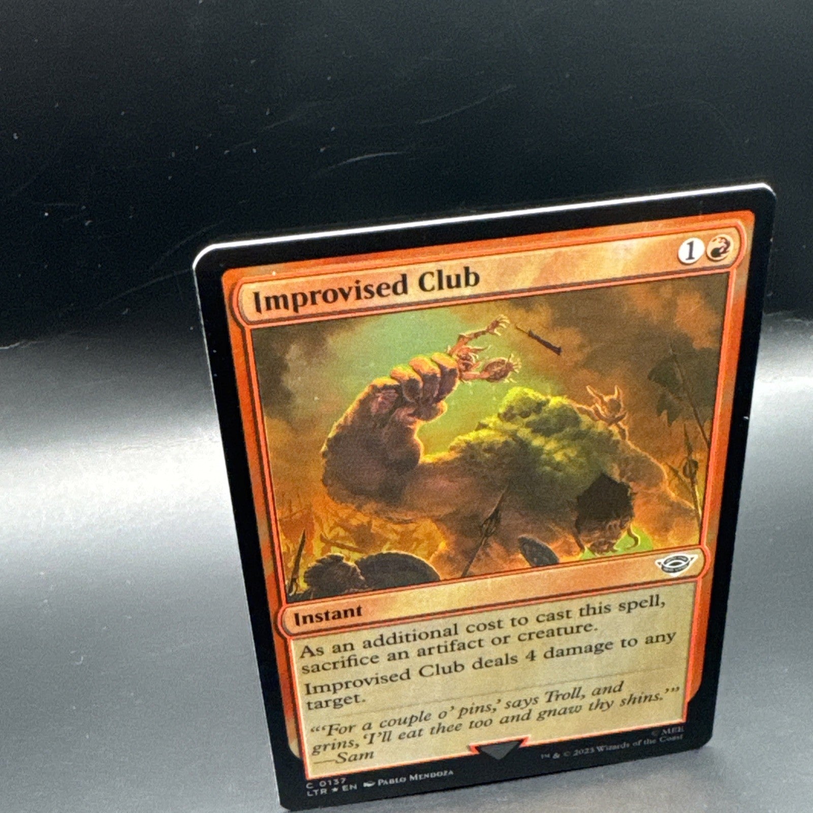 MTG Improvised Club (Foil) Tales of Middle-Earth C0137 + 1 Regular Card