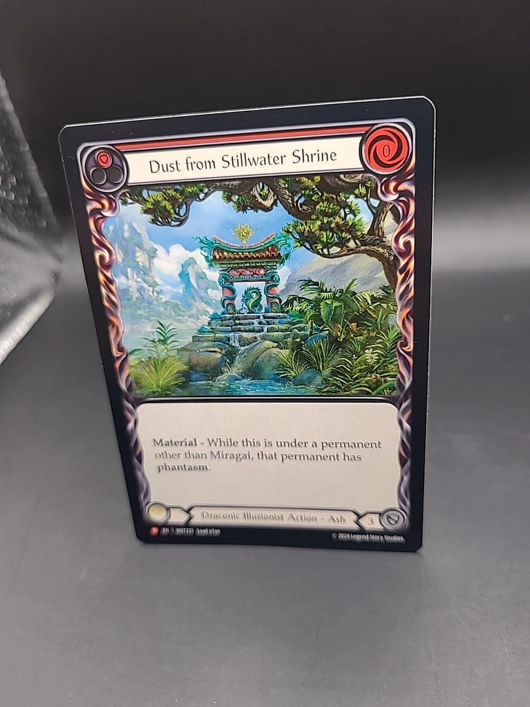 Dust from Stillwater Shrine - MST235 - Majestic - REGULAR - Flesh and Blood TCG