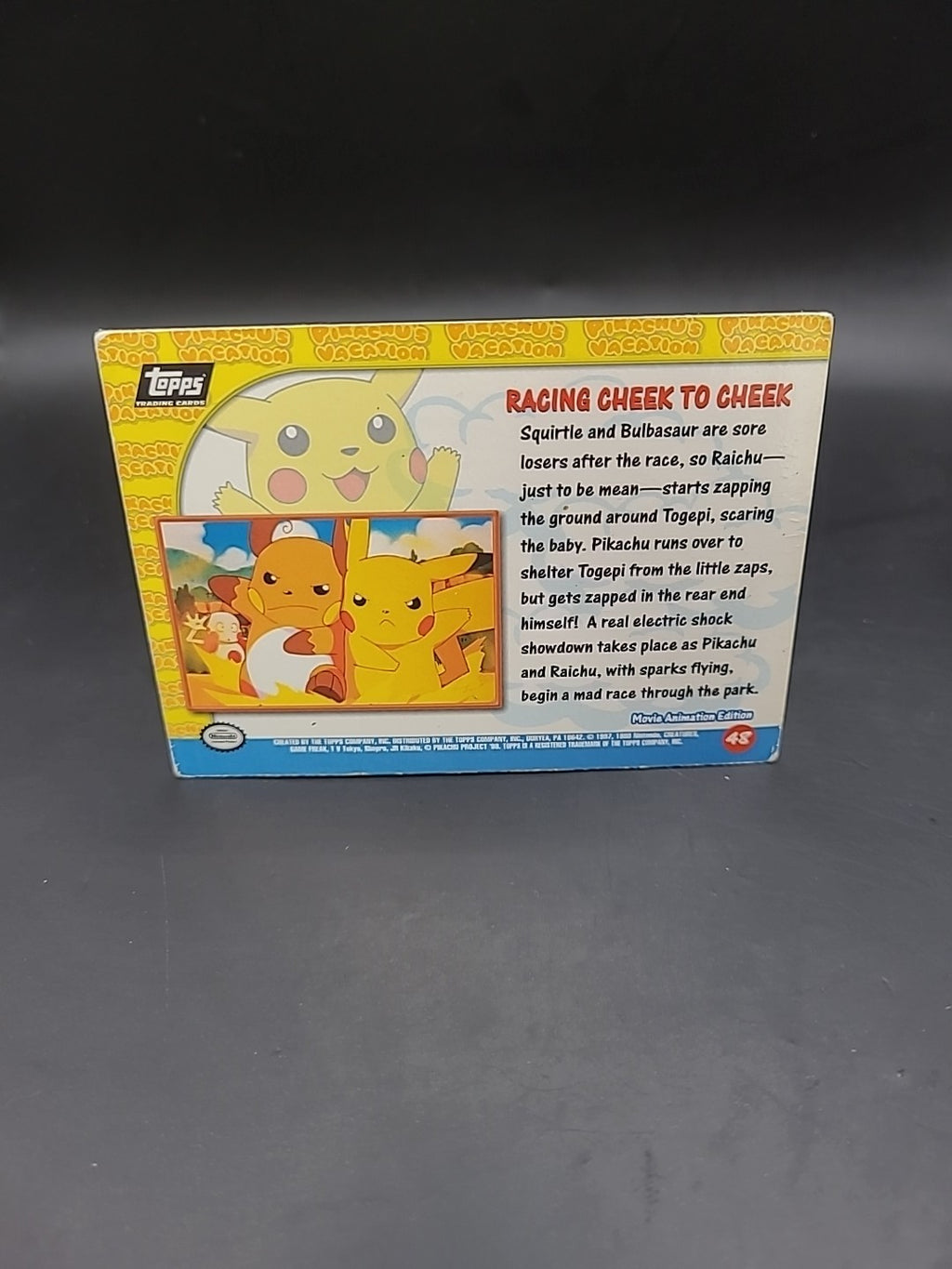 Topps Racing Cheek to Cheek #48 Pikachu's Vacation Pokemon Card Textured Holo