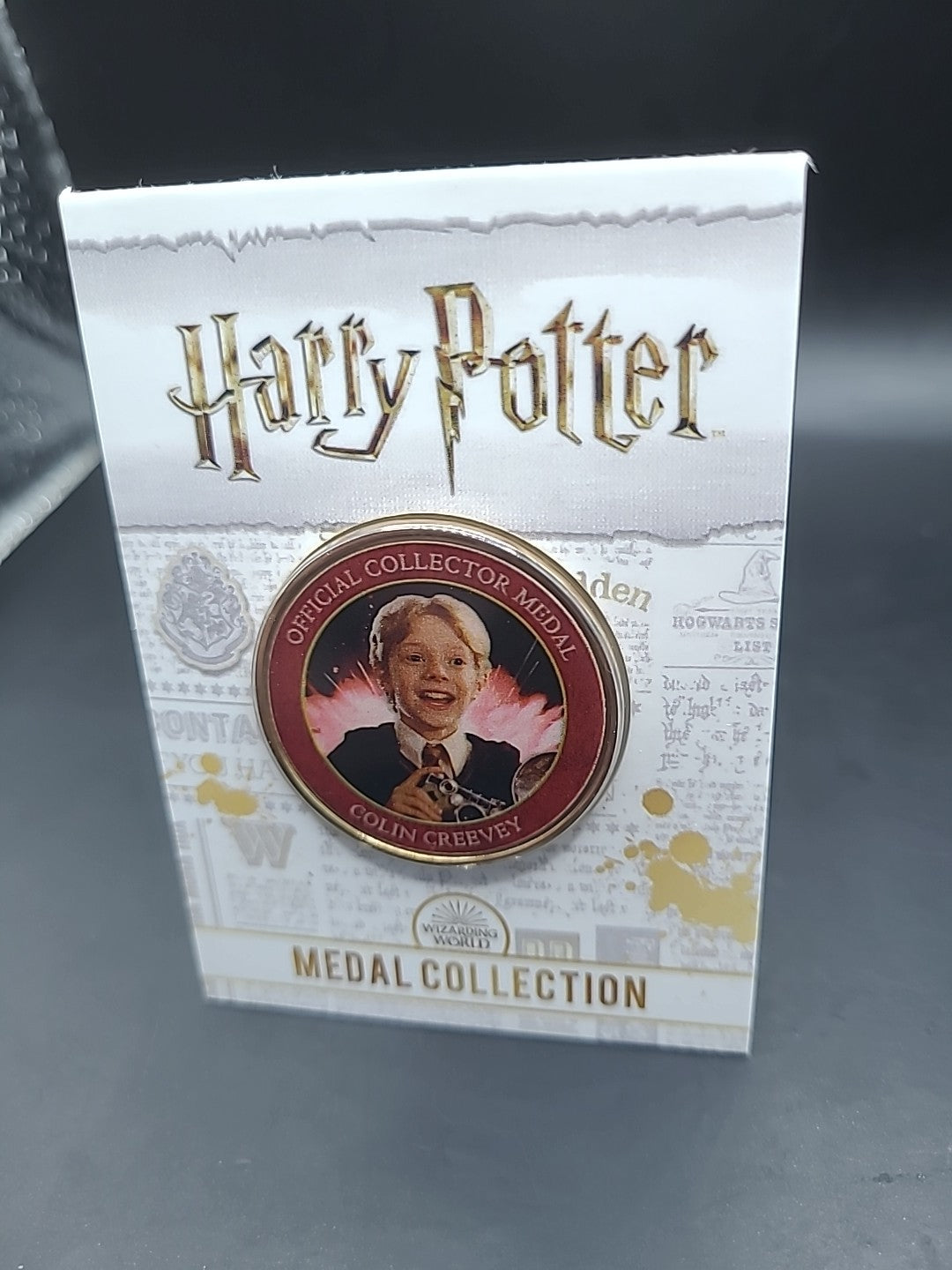 HARRY POTTER CARD WITH MEDAL COLIN CREEVEY HUGH MITCHELL J K ROWLING