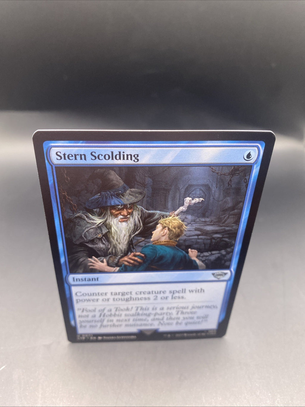 Stern Scolding Foil + 1 Regular Card, The Lord of the Rings MTG