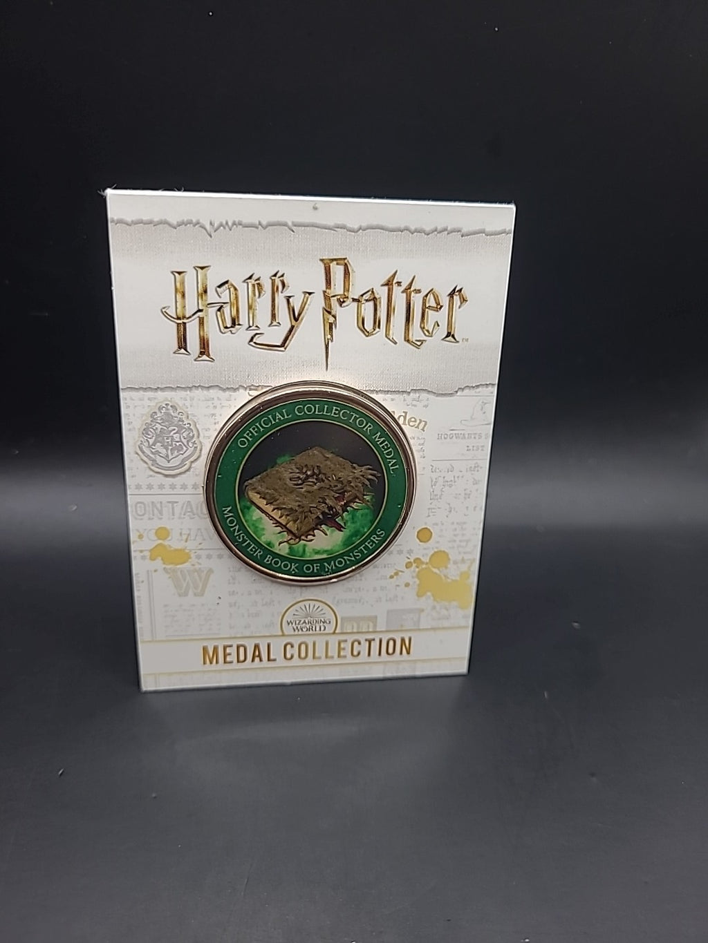 Harry Potter Medal Coin Collection Artefacts And Spells Monster Book Of Monsters
