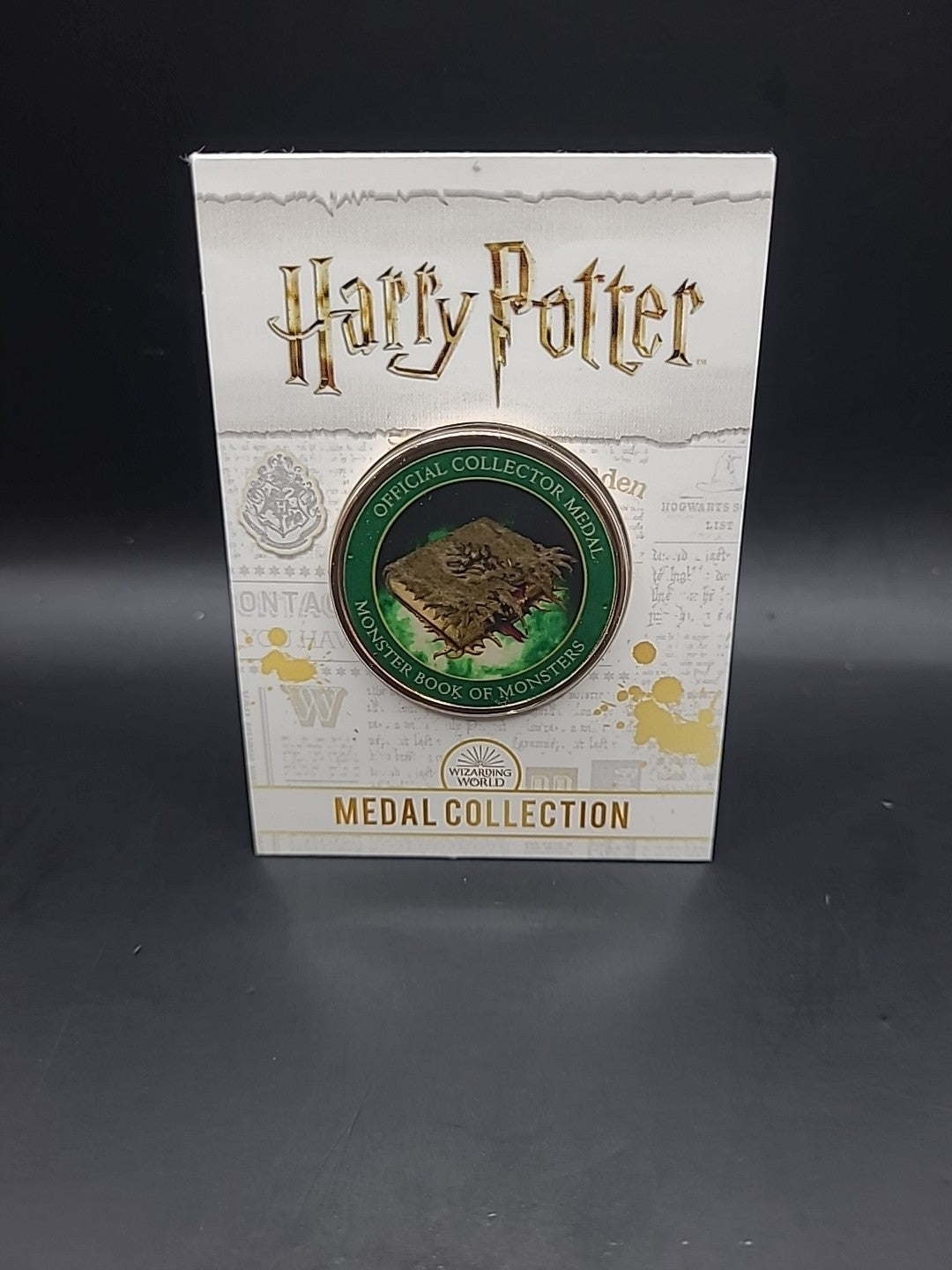 Harry Potter Medal Coin Collection Artefacts And Spells Monster Book Of Monsters