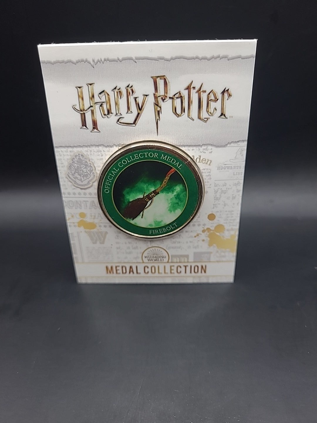 Harry Potter Medal Coin Collection - Artefacts And Spells - Firebolt